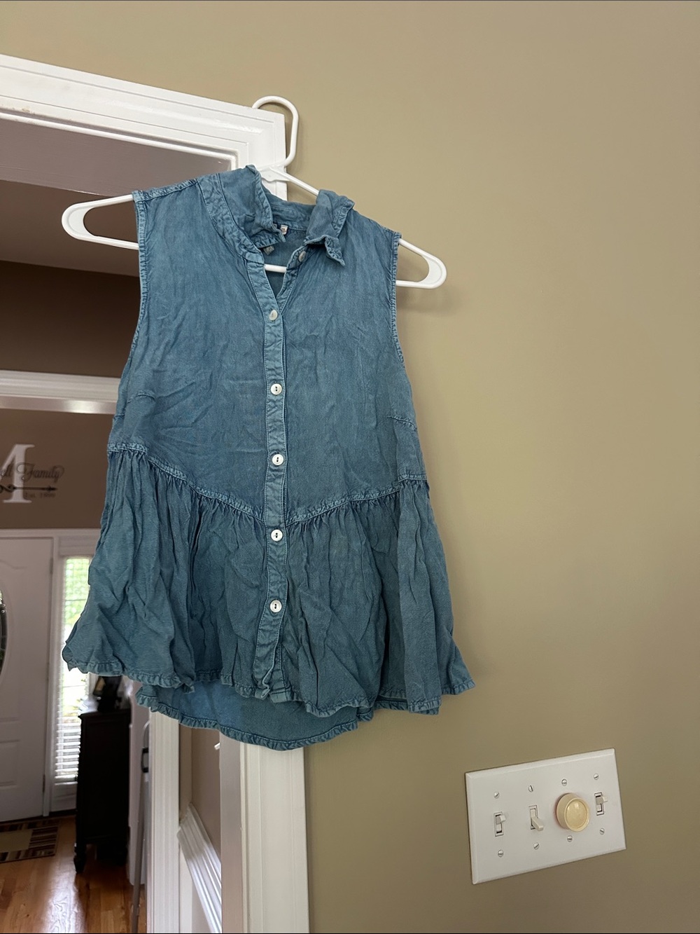 Sleeveless Blue Button-Front Peplum Top